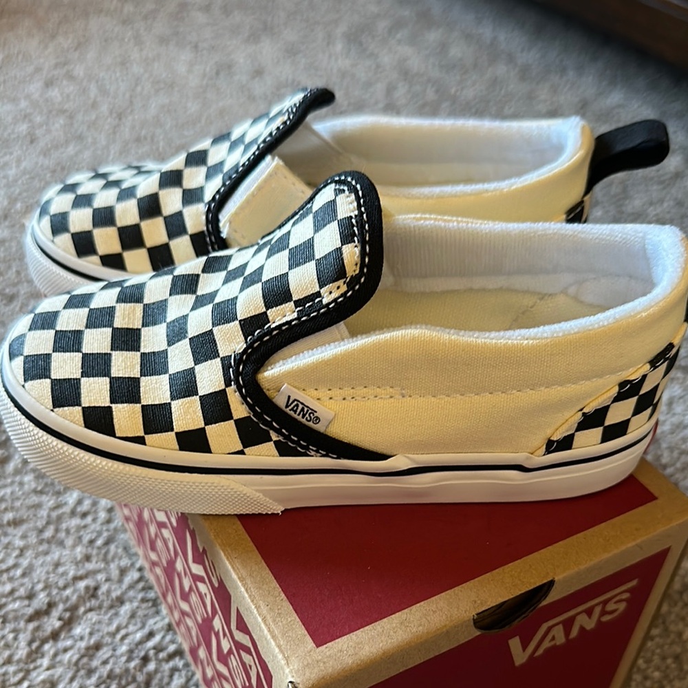 Vans Black and White Checkerboard Slip-On Sneakers
